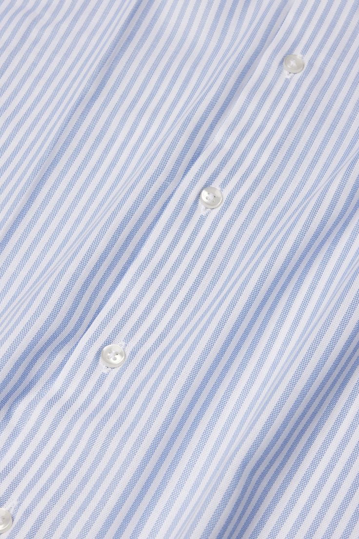 Color: sky-blue striped Material: 100% cotton Fitting: slim-fit Care instructions: dry clean only Blue Cotton Shirt With Horizontal Stripes, Spring Striped Slim Fit Shirt, Blue Fitted Tops With Vertical Stripes, Blue Fitted Top With Vertical Stripes, Fitted Blue Tops With Vertical Stripes, Fitted Blue Top With Vertical Stripes, Classic Blue Horizontal Stripe Tops, Classic Blue Horizontal Stripe Top, Striped Cotton Tops For Business