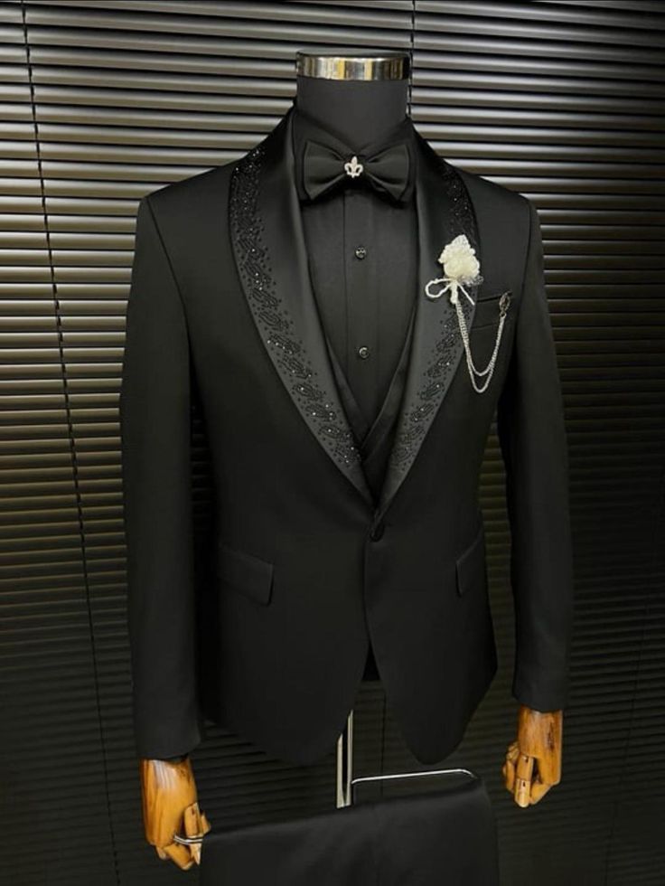 Package Includes: 1 x Jacket – 1 x Waistcoat – 1 x Pant

The custom black 3 piece suit with shawl lapel will be tailored to your unique measurements for a perfect fit. Our digital tailoring team will work closely with you to understand your requirements before hand-stitching your custom tuxedo.

 	Fabric: 100% Wool
 	Yarn: 120s
 	Lining Fabric: Silk
 	Pattern: Solid
 	Construction: Half Canvas
 	Seasonality: All Season
 	Jacket: Shawl Lapel, 2 Flap Pockets, Single Button Closure
 	Waistcoat: Black with Shawl Lapel
 	Trouser: Flat front, side seam slant pockets, 2 Back Pockets, Zip Closure Tuxedo Lapel Types, Black Tuxedo Style Outerwear With Shawl Collar, Luxury Black Shawl Collar Blazer, Tuxedo Style Blazer With Shawl Collar, Black Tuxedo Blazer With Shawl Collar, Tailored Black Tuxedo With Lapel Collar, Black Semi-formal Blazer With Shawl Collar, Black Three-piece Suit For Groom With Notch Lapel, Black Tuxedo Outerwear For Wedding