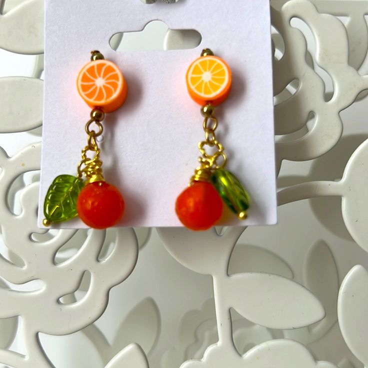 Cute Summertime Fashion Earrings, Gold Tone Wire And Post, Glass Beads And Made With Love . 1 Orange 2 Lemons 3 Lime Green Lemon Summer Orange Jewelry With Fruit Design, Cute Orange Jewelry For Party, Cute Orange Party Jewelry, Handmade Orange Beaded Earrings As Gift, Yellow Round Beaded Earrings For Gifts, Fun Orange Dangle Jewelry, Yellow Fruit Design Earrings For Gift, Yellow Fruit Design Earrings Gift, Yellow Fruit Design Earrings As Gift