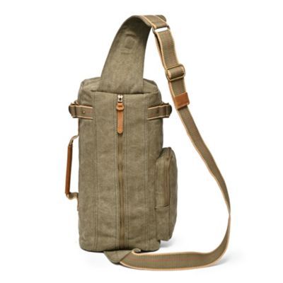 a canvas sling bag with an adjustable shoulder strap