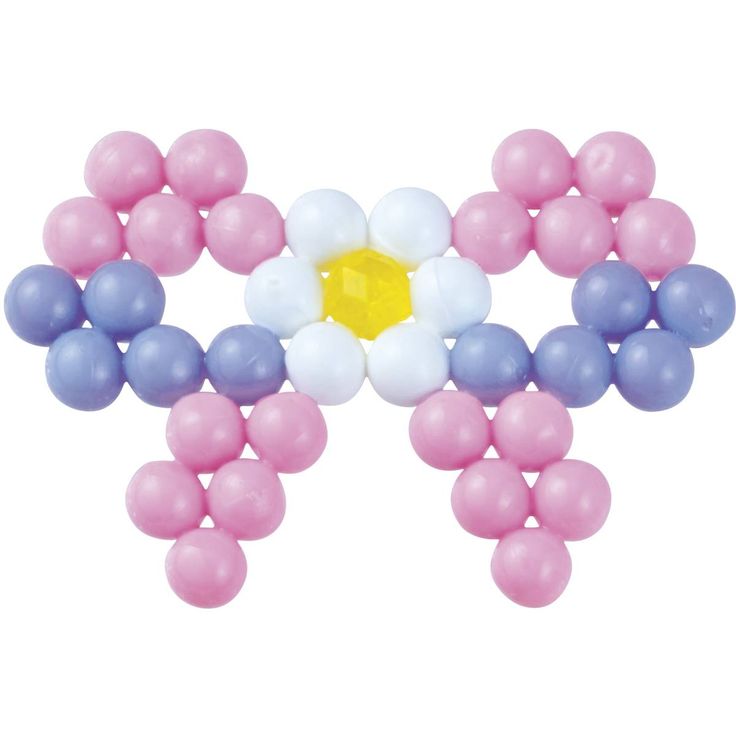 some balloons are arranged in the shape of flowers