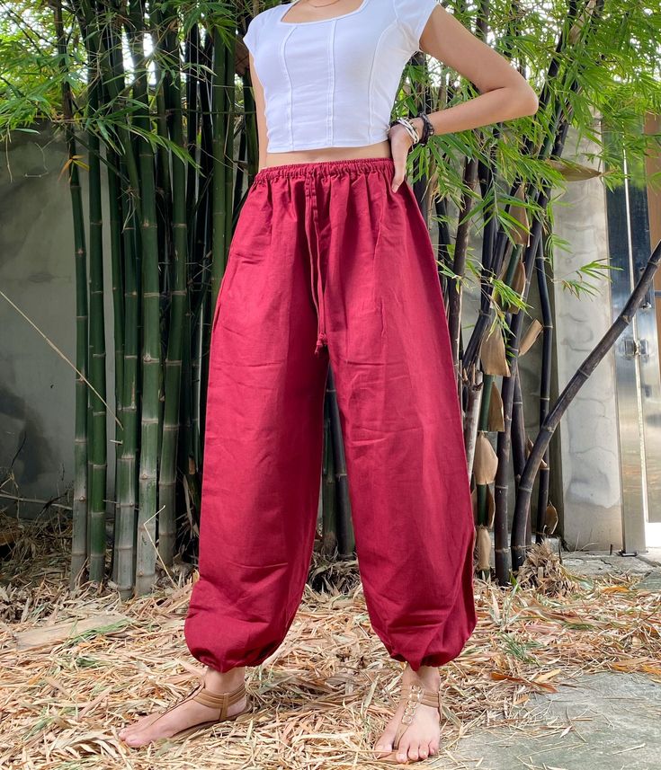 The harem style trousers made from cotton fabric 100%with an elasticated smock waist and ankles they provide a comfortable lightweight fit, perfect for casual wear, festivals, yoga, holidays as well as pairing with a plain top to get that popular look.   Materials: Cotton,Polyester Sizing: One size fits most. Size : (inches) ✿Waist 24" (61 cm) stretching to 46" (elastic material) (116 cm) ✿ Hip 30"- 48" ( 76-121 cm ) ✿ Length 38" ( 100 cm ) ✿ Length around each legs: 10" (25 cm) can be stretch ( Traditional Summer Yoga Harem Pants, Summer Cotton Harem Pants With Loosely Fitted Hips, Summer Harem Pants For Meditation With Relaxed Fit, Summer Relaxed Fit Harem Pants For Meditation, Casual Cotton Parachute Pants For Yoga, Casual Yoga Pants Loosely Fitted At Hips For Festival, Casual Summer Harem Parachute Pants, Summer Harem Parachute Pants With Elastic Waistband, Casual Cotton Harem Pants For Yoga