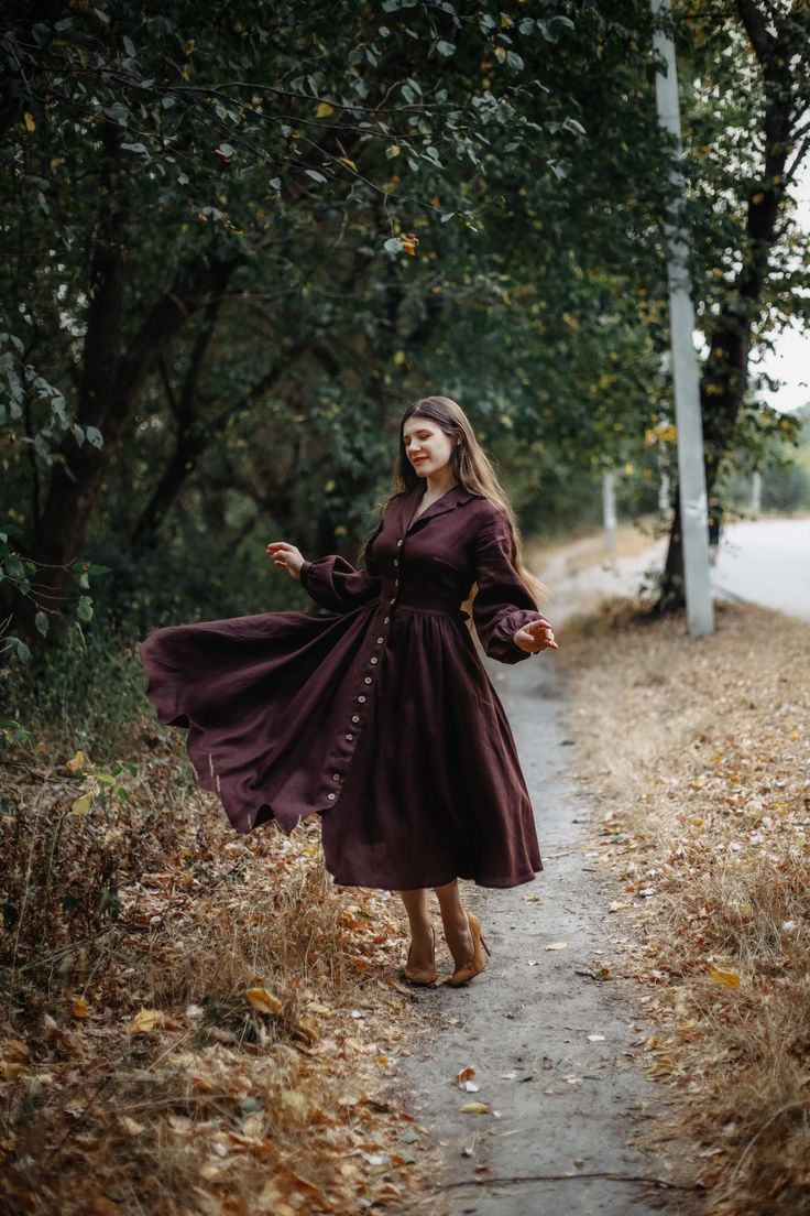 the Jane dress made of natural linen is modest, elegant and very beautiful. The dress will be sewn to your individual measurements in the color of your choice. Model details:  The bodice of the dress has a fitted silhouette. There are ribbon-belts sewn into the side seams, which can be tied into a bow on the back. They help regulate the degree of fit at the waist. The skirt is full with pleats at the waist. puffy sleeves with button cuffs. The dress is fastened with buttons made of natural wood. Pockets are hidden in the side seams of the skirt. The dress is comfortable for breastfeeding women, thanks to the buttons that can be unfastened. To sew a dress I need the following measurements:  1.bust circumference (in a bra, but without other clothes)  2.waist circumference (the narrowest poin Elegant Linen Dress With Buttons For Fall, Elegant Buttoned Linen Dress For Fall, Modest Corset Dress, Elegant Fall Linen Dress With Buttons, Elegant Brown Linen Dress, Elegant Linen Midi Dress For Fall, Elegant Linen Dress For Fall, Elegant Knee-length Linen Dress For Fall, Elegant Fall Linen Midi Dress