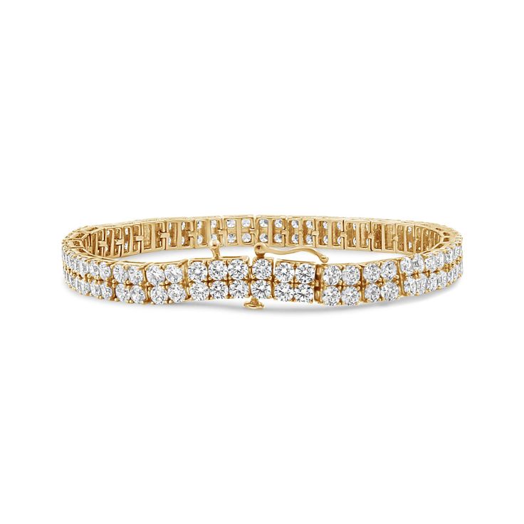 With its double-row brilliance, this 14K yellow gold tennis bracelet is a symphony of sparkle and sophistication. Each round, brilliant-cut diamond is meticulously set within a four-prong embrace, totaling 128 stones that together offer an impressive 10.0 carat weight. The natural diamonds, with their L-M color and I2-I3 clarity, dance with light, creating a captivating display of luminosity and luxury. Designed to gracefully adorn wrists up to 7.25 inches, this bracelet is a timeless testament Gold Tennis Bracelet, Summer Clearance, Central African, Tennis Bracelet, Classic Elegance, Brilliant Cut Diamond, Round Brilliant, Natural Diamonds, The Row