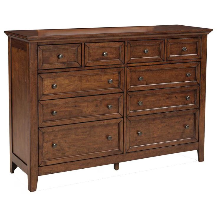 a large wooden dresser with many drawers