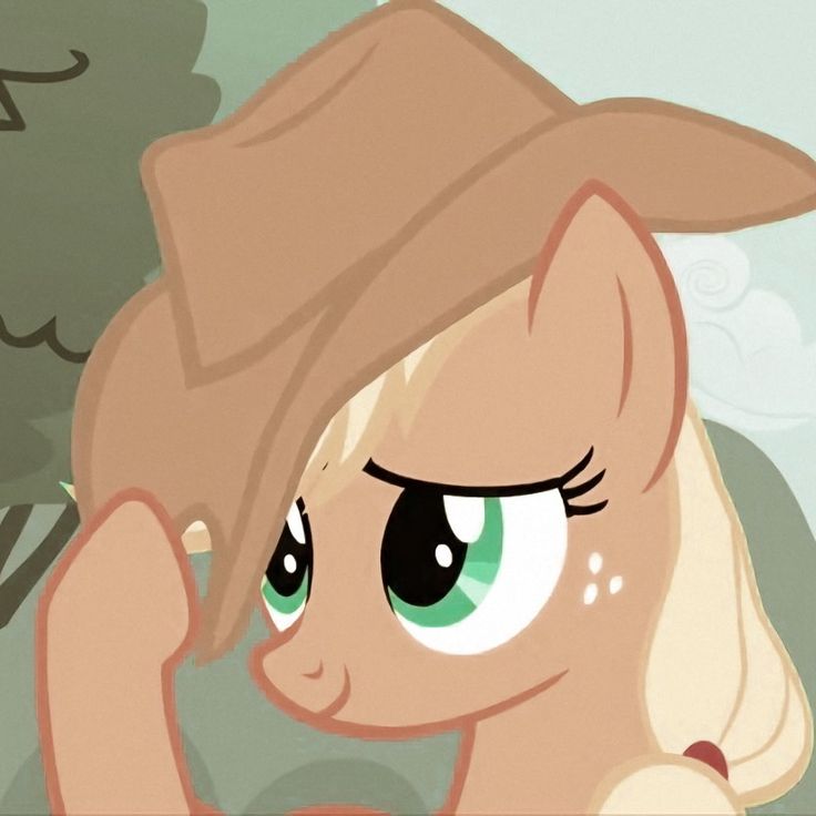 a pony with green eyes and blonde hair is looking at something in front of her