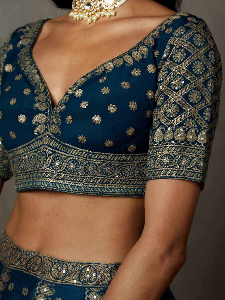 Editor's Note Elevate your ethnic charm with our midnight blue ari-hand embroidered ashvika lehenga set, complete with a blouse and matching dupatta. This ensemble features intricate hand embroidery, perfect for special occasions and celebrations, offering a touch of timeless elegance to your wardrobe. Color: Blue Components: Lehenga, blouse and dupatta Occasion: Reception Note: Product colour may slightly vary due to photographic lighting sources Care: Dry clean only About the DesignerRi Ritu K Brocade Blouse, Personal Shopping Service, Ritu Kumar, Wardrobe Color, Brocade Blouses, Ancient Designs, Lehenga Blouse, Photographic Lighting, Personal Shopping