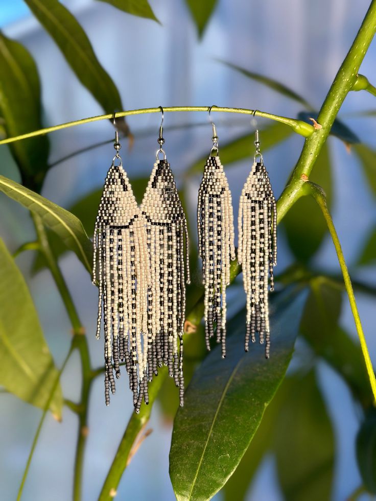 Hand beaded Striper earrings available in small $95 Silver Beaded Fringe Dangle Tassel Earrings, Silver Dangle Tassel Earrings With Beaded Fringe, Silver Beaded Fringe Tassel Drop Earrings, Silver Fringe Beaded Earrings For Gift, Silver Beaded Tassel Earrings, Silver Beaded Fringe Earrings For Gift, Silver Beaded Fringe Dangle Jewelry, Silver Jewelry With Fringe And Round Beads, Elegant Silver Beaded Earrings With Fringe