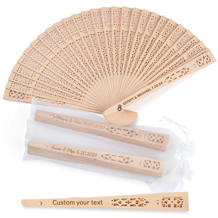 the wooden fan is next to its packaging