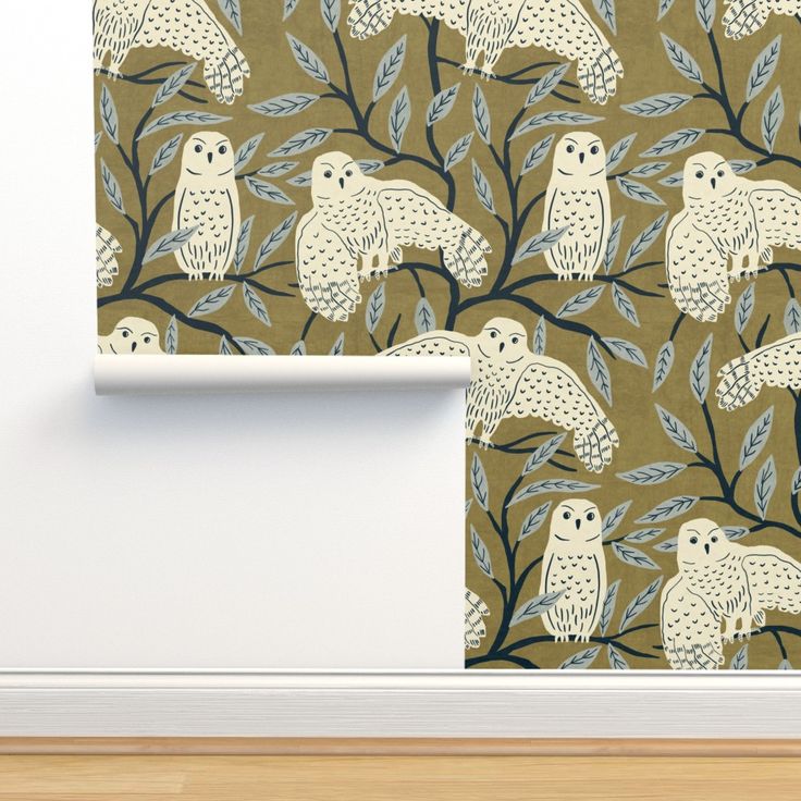 an owl themed wallpaper with leaves and branches