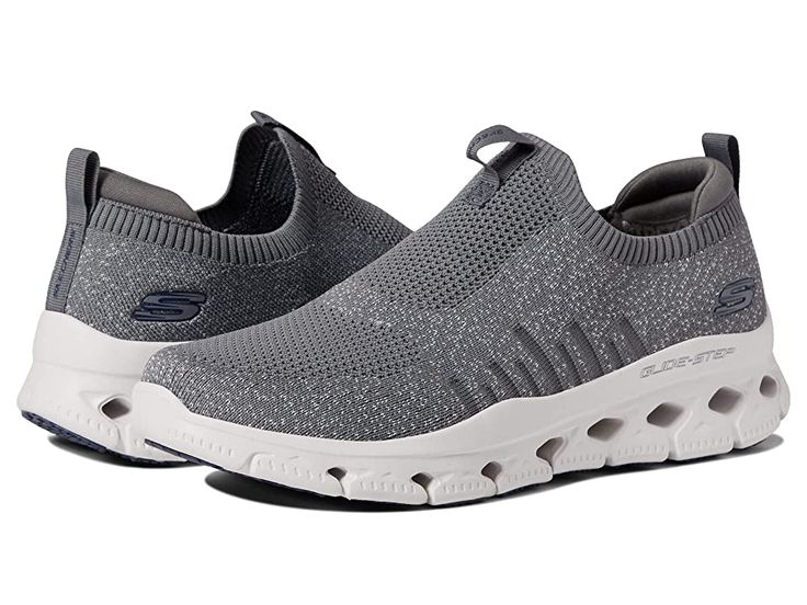 SKECHERS Glide-Step Flex - Men's Shoes : Charcoal : Go out with ease and total comfort wearing the SKECHERS Glide-Step Flex shoes. Textile and synthetic upper. Textile lining. Textile insole. Memory Foam gel-infused insole for cushioning and comfort. Mesh construction on the upper for breathability. Lightweight Glide-Step midsole for added comfort. Pull tab on front and back. Slip-on closure. Goodyear rubber performance outsole. Imported. Measurements: Heel Height: 1 1/2 in. Weight: 10.75 oz. We Gray Synthetic Slip-on Sneakers With Arch Support, Dynamic Moisture-wicking Synthetic Running Shoes, Cushioned Athletic Fit Slip-on Sneakers For Jogging, Mesh Slip-on Running Shoes For Light Sports, Sporty Slip-on Sneakers With Breathable Mesh For Running, Breathable Synthetic Gray Running Shoes, Breathable Gray Synthetic Running Shoes, Dynamic Walking Shoes With Arch Support For Sports, Light Sports Sneakers With Cushioned Footbed