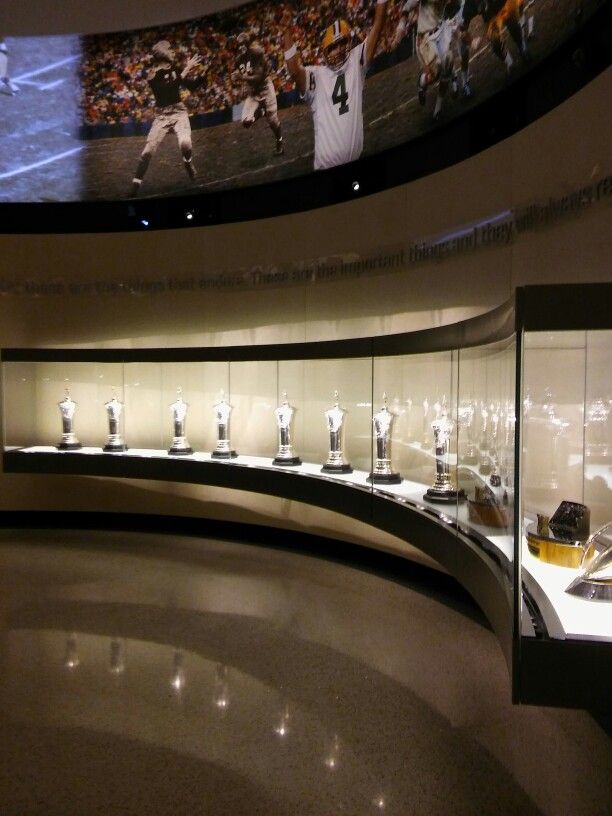 the sports museum is filled with trophies and trophy cups