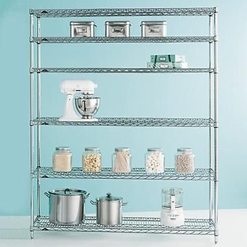 four tier shelving unit with various items on it