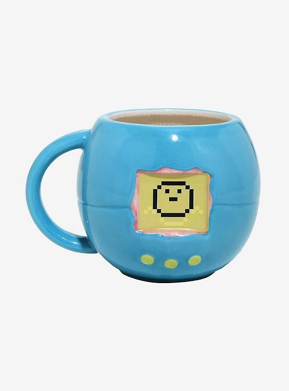 a blue mug with an emoticive face on it