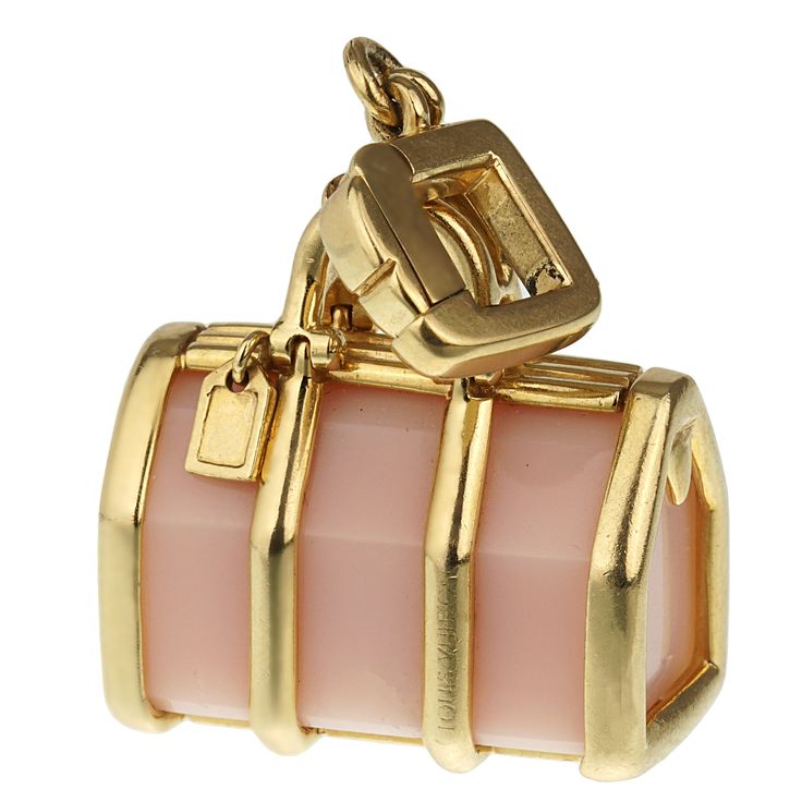 Experience the epitome of elegance and versatility with the Louis Vuitton Yellow Gold Rose Quartz Bag Charm. Crafted with exquisite attention to detail, this versatile piece can be worn as a pendant, or even added to a charm bracelet, showcasing its adaptable nature. The charm is meticulously designed from 18k yellow gold, known for its rich, luxurious sheen that radiates warmth. The lustrous yellow gold perfectly complements the mesmerizing tones of the rose quartz, creating a harmonious balanc Luxury Logo Bag Charm For Gift, Luxury Logo Bag Charm As Gift, Luxury Bags With Logo Charm For Gift, Luxury Rectangular Jewelry With Gold-tone Hardware, Luxury Rose Gold Jewelry With Box Clasp, Elegant Gold Bag With Logo Charm, Luxury Gold-tone Jewelry As A Gift, Elegant Bag Charm With Logo, Luxury Pink Jewelry With Logo Charm