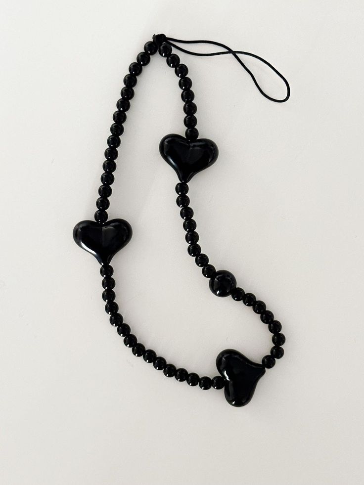 Black Heart Beads Strap    Color: Black Beads Size: 5 mm Heart Charm Size: 1.5*2.0 cm Length: 14.5+5 cm    🖤Free domestic shipping: AU$59+. International free shipping: AUD $180+ :) - Via AUS POST, dispatch daily [Mon-Fri]. 🖤All-Time Discount Code: SAVE10 [10% Off Min 2 items] SAVE20 [20% Off Min 4 items] Black Beaded Heart-shaped Jewelry, Handmade Black Heart Beaded Necklaces, Handmade Black Heart-shaped Beaded Necklaces, Adjustable Black Beaded Necklace With Heart Beads, Handmade Black Heart-shaped Beaded Necklace, Black Heart Beaded Necklace, Black Beaded Necklaces With Heart And Round Beads, Black Beaded Necklaces With Heart-shaped Beads, Black Heart Beads Necklace