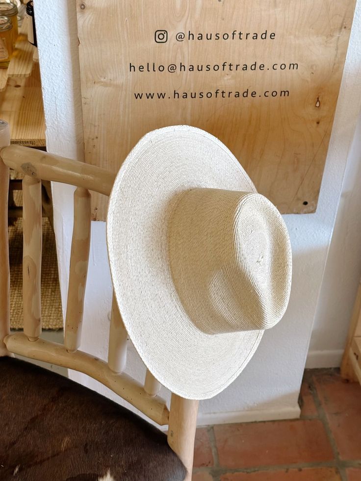 BEST SELLER WITH A TRADITIONAL RANCHER FIT – the ultimate in chill, minimalist vibes! Crafted from 100% Fine Palm Leaf Straw, this hat embodies organic quality while maintaining a re-shapable, and water-shedding nature. Its self-conforming design, paired with an #inclusive touch, renders it unisex and universally flattering. The expansive brim of the Sunbleached Rancher not only adds an element of refinement but also serves as an ideal accessory for sunny occasions. The straw undergoes a natural Natural Lightweight Casual Boater Hat, Everyday Summer Hats With Flat Crown, Casual Lightweight Natural Boater Hat, Everyday Summer Hat With Flat Crown, Casual Lightweight Flat Brim Hat, Summer Panama Hat With Flat Crown For Everyday, Beige Curved Brim Panama Hat For Everyday, Natural Boater Hat With Flat Brim For Everyday, Lightweight Straw Hat With Curved Brim