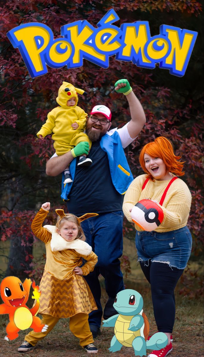 two adults and one child are posing for a photo in front of the pokemon sign