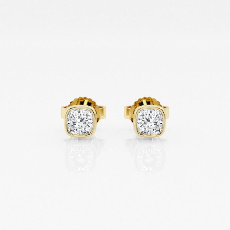 Get cozy with these cushion shaped diamonds wrapped around with a beautiful bezel. Lab grown diamond stud earrings that make a perfect gift for that perfect someone. Luxury Yellow Gold Diamond Earrings With Bezel Setting, Luxury Diamond Earrings With Cushion Cut And Accents, Cushion Cut Diamond Luxury Earrings, Elegant Cushion Cut Yellow Gold Earrings, Luxury Cushion Cut Diamond Earrings For Gift, Luxury Bezel Set Diamond Earrings For Formal Occasions, Luxury Bezel Set Earrings As Gift, Luxury Diamond Earrings With Bezel Setting For Formal Occasions, Classic Cushion Cut Diamond Earrings For Wedding