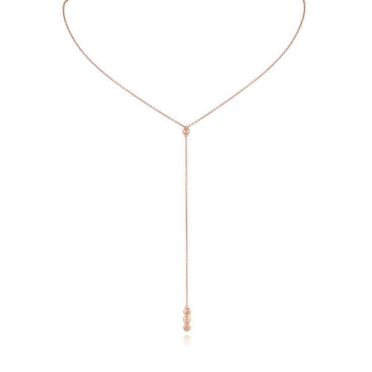 Keep these tiny truths close to your heart. Delicate and smooth, the Seed Lariat is a necklace that will last a lifetime. This lariat has three small seeds that hang beautifully from a dainty golden chain. This necklace is the most elegant of pieces, making it the perfect choice to effortlessly dress up any look. The Seed Lariat is stunning and will bring classic beauty to your jewelry collection. Dainty Rose Gold Lariat Necklace, Fine Jewelry Lariat Necklace With Pendant And Adjustable Chain, Fine Jewelry Lariat Drop Necklace With Adjustable Chain, Delicate Long Drop Clavicle Chain Necklace, Delicate Rose Gold Lariat Necklace, Dainty Long Drop Necklaces With Adjustable Chain, Dainty Long Drop Necklace With Adjustable Chain, Fine Jewelry Long Drop Necklace With Adjustable Chain, Dainty Clavicle Pendant Lariat Necklace