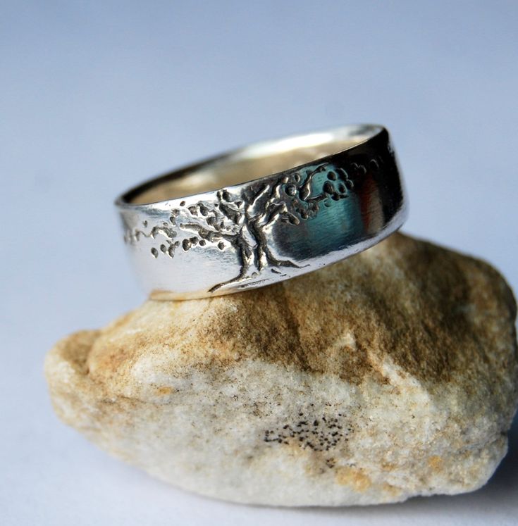 "Tree of Life Band, Sterling Silver Band 8mm wide,Tree Wedding Band, 5/16\" wide all around. I love to wear this ring on my index finger! 1.5mm thick and very comfortable with the tree image darkened highlighting it beautifully. Highly polished on the outside and a satin finish on the inside. Look in MY \"S/S tree of life ring\" section for brushed finish. Engraving complementary for DATE (02-05-2019) or dot between,  10 numbers or letters . I do not have  !@#$&? or comma.  For longer engraving Stamped Sterling Silver Wide Band Jewelry, Unique Etched Jewelry For Wedding, Unique Etched Wedding Jewelry, Silver Sterling Silver Wide Band Promise Ring, Engraved Wide Band Jewelry For Promise Ring, Sterling Silver Wide Band Wedding Jewelry, Unique Engraved Ring For Wedding, White Gold Thick Band Jewelry For Wedding, Unique Engraved Wedding Ring With Etched Design