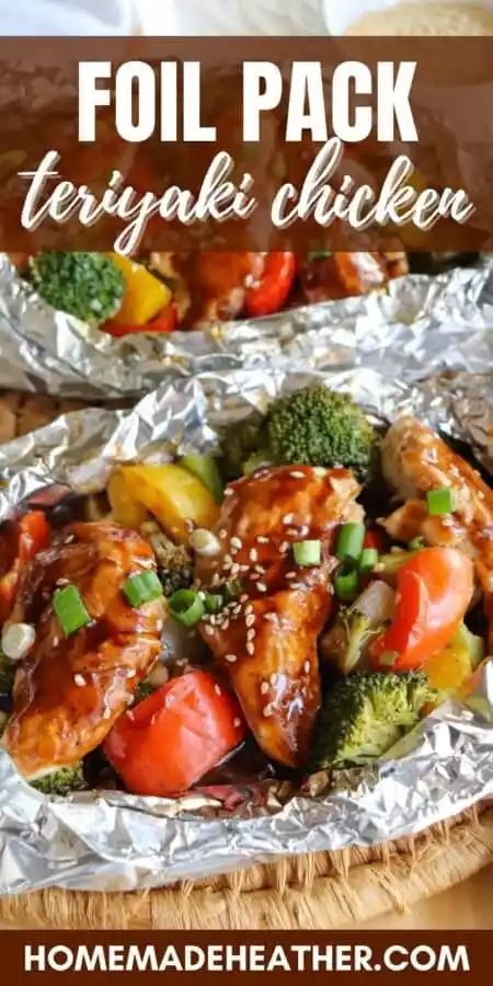 foil packet teriyaki chicken with broccoli, tomatoes and peppers in it