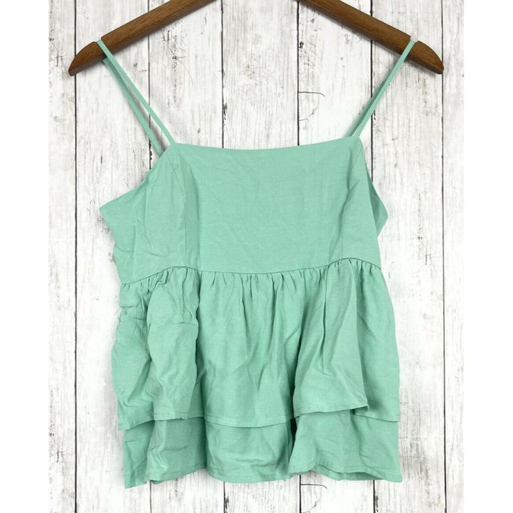 Forever 21 Women S Sage Blue Cami Sleeveless Woven Ruffle Top. Summer Cotton Camisole With Ruffled Straps, Summer Vacation Peplum Top With Ruffles, Cotton Camisole With Ruffled Straps For Summer, Spring Cami Vest With Adjustable Straps, Sleeveless Summer Vest With Adjustable Straps, Spring Sleeveless Vest With Adjustable Straps, Summer Sleeveless Camisole For Brunch, Sleeveless Ruffled Crop Top For Vacation, Spring Tank Vest With Adjustable Straps