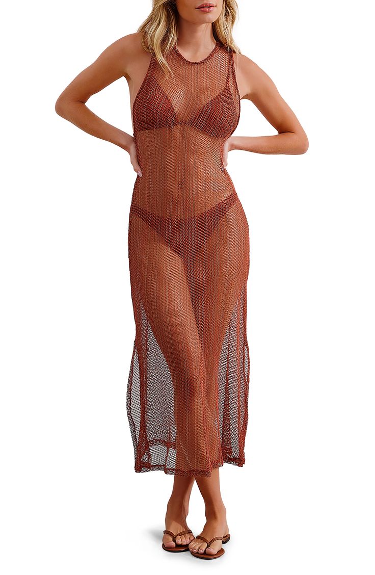 This stunning cover-up dress is completely sheer to show off what's underneath as you lounge by the water feeling your most confident. 43" length ( size Medium) Slips on over head Jewel neck Sleeveless Sheer 58% polyamide, 32% polyester, 10% elastane Hand wash, dry flat Made in Brazil Hispanic & Latinx Owned/Founded Mesh Swimwear Beach Cover-up For Beach Season, Mesh Beach Cover-up For Beach Season, Mesh Summer Beach Cover-up, Summer Mesh Beachwear Cover-up, Summer Mesh Cover-up For Beach Season, Mesh Swimwear For Summer Beach Cover-up, Sheer Beachwear Cover-up For Poolside, Sheer Mesh Dress For Beach Vacation, Sheer Mesh Dress For Beach Season Vacation