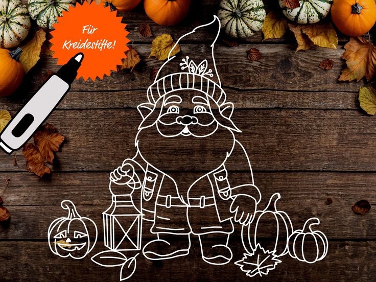 a wooden table topped with pumpkins and an orange marker next to a drawing of santa claus