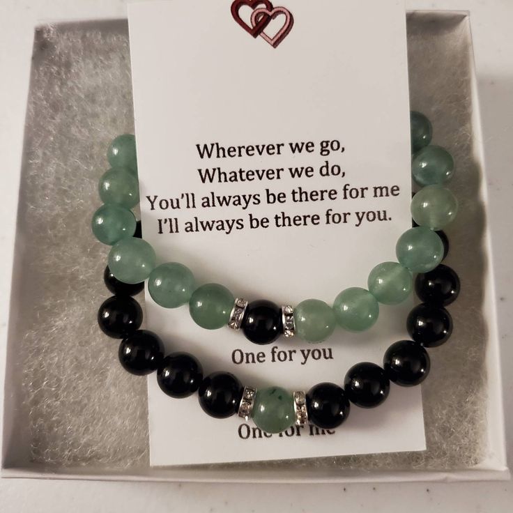 "Matching set of gemstone bracelets for couples, friends, or family Remind yourself of the special relationships you have with those that you adore with these couples/distance bracelets. Each set comes in a complimentary gift box with a note that reads: \"Wherever we go, Whatever we do, You'll always be there for me I'll always be there for you. One for you One for me\" Perfect for gift giving ; Christmas, Valentine's Day, Birthday, long distance relationships, or just friendships Green Aventurine and Black Onyx Bracelets are made with high quality, AAA grade genuine natural semi-precious 8mm gemstones and include a magnetic clasp to attach to one another.  (Your choice of silver or gold settings) Our bracelets are made with heavy duty 1mm elastic crystal string to ensure quality and stren Personalized Black Beaded Bracelets For Couples, Black Couples Bracelet Jewelry, Black Bracelet Jewelry For Best Friend Gift, Onyx Bracelets With Natural Stones For Gift, Onyx Bracelets With Natural Stones As Gifts, Black Couples Bracelets For Best Friend Gift, Couples Black Bracelets For Best Friend Gift, Gift Black Crystal Bracelet, Black Couples Jewelry Gift