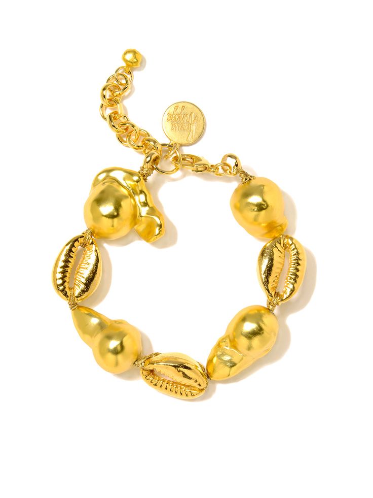 Indulge in the beauty of our Ocean Dream Bracelet! Made with gold plated brass, this bracelet features baroque pearls and shells, evoking the magic of the ocean. The perfect accessory for any dreamer (or beach lover) looking to add a touch of glam to their outfit. 6" Baroque pearl necklace 1.5" extension Lobster clasp closure Gold plated brass hardware and shell charms Handmade in New York City and Puerto Rico. Due to the handmade nature of our products, some charms may vary in color and style o Dream Bracelet, Baroque Pearl Necklace, Beach Lover, Hair Rings, Girly Jewelry, Bracelet Gold, Baroque Pearls, Brass Hardware, Ring Bracelet