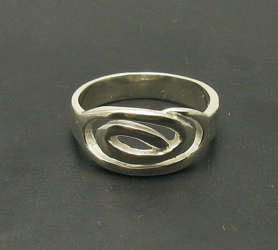 Sterling silver ring 925/1000. Stamped 925. Approximate weight 4.5 grams. Top width 0.9cm. All our jewels are made from solid sterling silver 925/1000 and are carefully crafted by hand in our family workshop. We dispatch your orders in 5 working days, worldwide and the postage is $5. We ship registered priority mail. Please allow 5-7 working days for delivery in Europe and 10-15 working days outside Europe. For any questions - please do not hesitate to contact me! Spiral Sterling Silver Ring Stamped 925, Fantasy Earrings, Cool Piercings, Snake Jewelry, Snake Earrings, Dope Jewelry, Wax Casting, Lost Wax Casting, Jewelry Lookbook