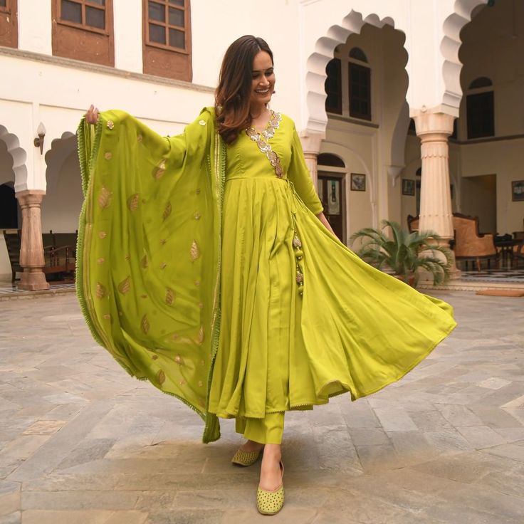 1,329 Likes, 15 Comments - Bunaai (@bunaai) on Instagram: “Be the epitome of elegance as you slay effortlessly wearing our brand new green suit set with the…” Plain Anarkali, Green Kurti, Trendy Suits, Matching Jewellery, Parrot Green, Embroidered Suit, Simple Kurti Designs, Long Dress Design, Traditional Indian Outfits