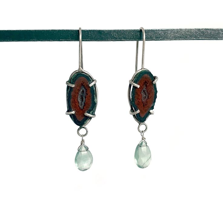 "Unique baby geode agates, hand set in a sterling silver prong setting. Great dark red center color, within a black/dark gray outside. Faceted sea mist chalcedony stones dance at the bottom.  Earrings are all handmade, and set by me in a sterling silver prong setting.   Size of earrings: 2\" length from top of wire to bottom of small stone. Geode is 3/8\"w x 3/4\"h Earrings are very light weight. Each stone is unique in size and shape. The indentations on the stone are natural.  These are one-of-a-kind. All jewelry comes packaged and ready to give as a gift or to yourself.   Thanks for stopping by my shop!" Unique Agate Teardrop Earrings, Geode Earrings, Chalcedony Stone, Unique Baby, Baby Sets, Dark Black, Dark Red, Prong Setting, Belly Button Rings