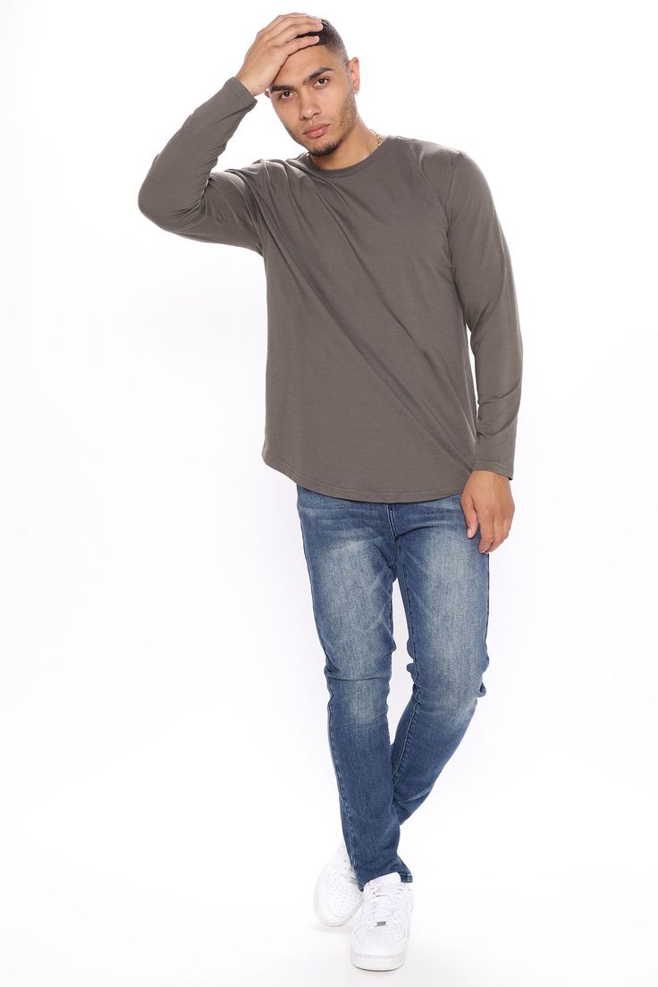 Available In Black, Burgundy, Grey, Navy, Olive And White Crew Neck Long Sleeve 100% Cotton Imported | Mens Essential Long Sleeve Scallop Tee Shirt in Olive Green size XL by Fashion Nova Basic Gray Long Sleeve Top, Casual Stretch Top With Shirttail Hem, Casual Long Sleeve Tops With Relaxed Fit, Casual Long Sleeve Relaxed Fit Top, Casual Cotton Long Sleeve Top, Gray Relaxed Fit Long Sleeve Top, Casual Long Sleeve Stretch T-shirt, Casual Stretch Gray Shirt, Gray Long Sleeve Relaxed Fit Top