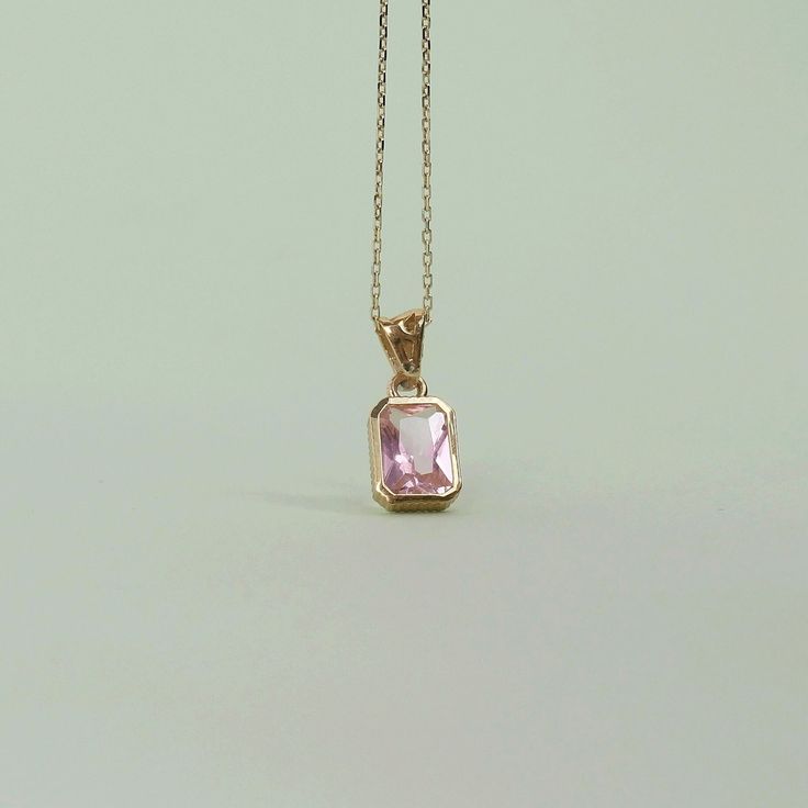 Genuine Morganite Necklace Gold Dainty Pink Morganite Pendant, made from Morganite stone. With its crystalline structure, it breaks the light and will shine in your hand. ➤ Necklace Details * 14K Yellow Gold * Gold Color Options; 14K White, Yellow, Rose Gold * Pendant Width: 0.20 inches * Pendant height: 0.28 inches * Gold chain width: 0.25*0.30 millimeter * Gold chain length on Model: 16 Inches ➤ Gem Details * Gemstone 1 : Morganite * Gem width: 5 millimeter * Gem length: 7 millimeter * Cut Typ Morganite Necklace, Morganite Pendant, Crystalline Structure, Hand Necklace, Pink Morganite, Rose Gold Pendant, Gold Gift, Pink Gemstones, Pink Stone