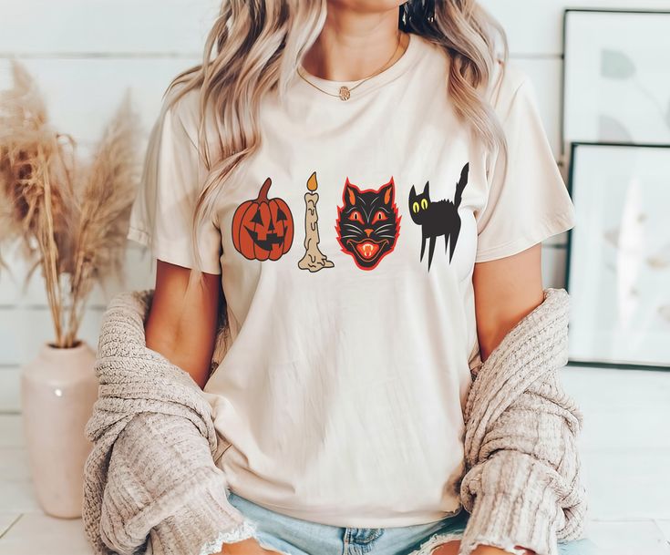 Vintage Halloween Shirt Or Sweatshirt Fashionable fun designs printed on premium quality shirts for women, men and kids. With over 100+ tee shirts, workout and fitness tanks, birthday shirt, bachelorette party shirts, family vacation tees, cruise tees, custom t shirts, pet shirts and more being added weekly. We have something for everyone! We offer this t-shirt/sweatshirt in adult unisex/men's sizes ranging from S-XXL. Don't see what you want? Just ask! We might be able to make it for you. 70s Halloween, 80s Halloween, Pet Shirts, Bachelorette Party Shirts, Halloween Sweatshirt, Retro Halloween, Fun Designs, Workout Tanks, Custom T Shirts