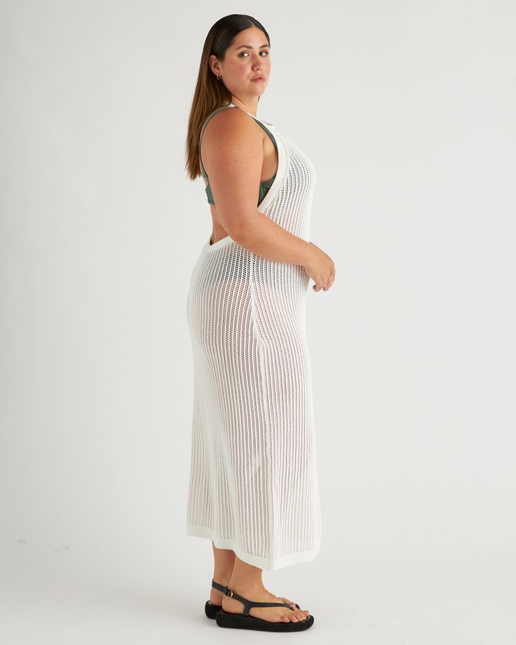 Our breezy open-knit cover-up is made with 100% organic cotton. It is easy enough to throw over your swimsuit and chic enough for a day of sightseeing or an afternoon at the beach. With a halter-top fit that’s relaxed, but still flattering, it’s the perfect complement to your favorite swimwear.  | Quince | Women's Open-Knit Cover-Up Maxi Dress in White, Size XS, Organic Cotton Spring Knit Cover-up For Warm Weather, Sleeveless Beachwear Cover-up For Loungewear, Beachy Open Knit Cover-up For Poolside, White Beachwear Cover-up For Warm Weather, White Knit Beachwear Cover-up, Stretch Knit Beach Dress, Spring White Knit Cover-up, White Knit Beachwear Dress, Chic Knit Beach Cover-up