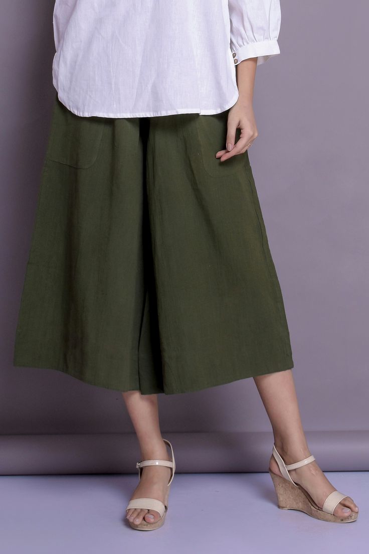 Wide Leg Pants, Linen Palazzo Pants, Loose Pants, Casual Baggy Pants - Custom made by Modernmoveboutique >DESCRIPTION: - loose and roomy. - Side patch pockets - made from Linen blend. The fabric is of medium weight (185 g). - the model is 172 cm high (regular XS - S) and is wearing size S. - color in the picture - OLIVE GREEN (Please choose any other color on the right). >COLOR< NOTE - The pants are available in 25 colors. - We found out the fabric to be rather hard to photograph to hav Khaki Wide Leg Bottoms With Relaxed Fit, Baggy Wide Leg Khaki Bottoms, Green High-waisted Baggy Wide Leg Pants, Wide-leg Khaki Harem Pants With Pockets, Wide Leg Khaki Harem Pants With Pockets, Khaki Wide Leg Harem Pants With Pockets, Khaki Wide Leg Pants With Side Pockets, Khaki Straight Pants With Loosely Fitted Hips, Casual Wide-leg Culottes With Pockets