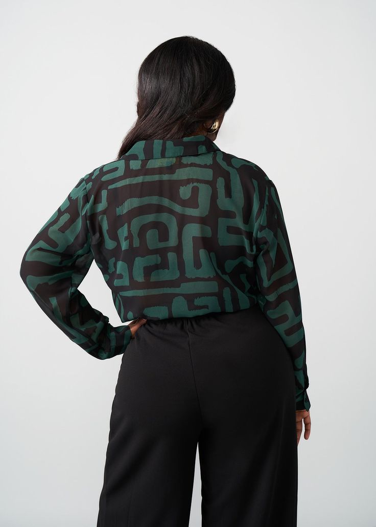 Style#: 5024/P5024 Jazz up your work fit with the Zoela Women's African Print Sheer Blouse in the Black Malachite Geometric print—an African twist to a classic sheer button-up blouse that is sure to add flavor to your wardrobe. Features: Self-lined Buttons at sleeve cuff Pointed collar 100% Polyester​ Sheer, lightweight fabric Designed in the USA, imported Care Instructions: Machine wash cold on gentle cycle with non-chlorine detergent. Hang to dry. Do not bleach. Iron on low. Models: Size: XS H Black Sheer Blouse, Sleeve Cuff, Mens Fall, Workout Accessories, Printed Bags, Blouse Black, Sheer Blouse, Swimwear Accessories, Womens Fall