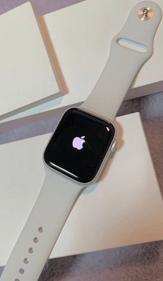 an apple watch sitting on top of a table