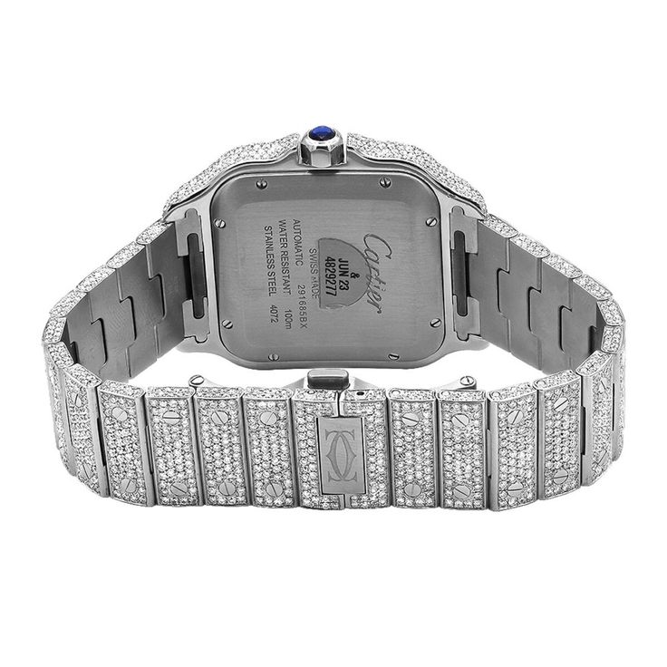 The exquisite Cartier Santos Iced Out 40mm Diamond Watch. This timepiece is truly a masterpiece, combining Cartier's renowned craftsmanship with the brilliance of diamonds to create a watch that is both elegant and eye-catching.
Diamond Cartier Santos 40mm Watch is a stunning timepiece that features a stainless steel case and bracelet, adorned with meticulously set diamonds. The dial showcases the iconic Roman numeral hour markers and sword-shaped hands that are characteristic of the Cartier San Iced Out Cartier, Cartier Diamond Watch, Diamond Watches For Men, Watches Collection, Diamond Jewelry Store, Amazing Watches, Cartier Santos, Watch For Men, Roman Numeral