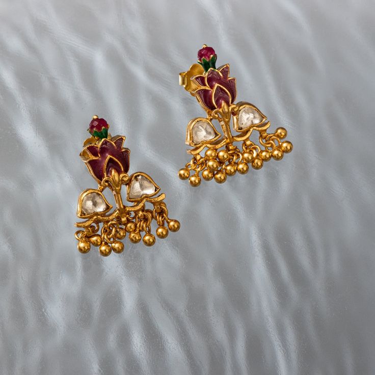 Introducing our beautiful collection of Lotus Studs, a symbol of purity, beauty, and enlightenment. Our Zuri Lotus Studs are meticulously crafted with the finest semi-precious stones and beads. They feature a delicate and minimalist design, with the lotus flower symbol in the center of the earring. Traditional Flower-shaped Jewelry For Diwali, Traditional Flower Jewelry For Diwali, Traditional Festive Jewelry With Natural Stones, Elegant Lotus Flower Jewelry Gift, Spiritual Jewelry With Natural Stones For Festive Occasions, Elegant Natural Stones Jewelry For Meditation, Elegant Natural Stone Jewelry For Meditation, Traditional Flower Shaped Jewelry, Traditional Festive Flower Jewelry