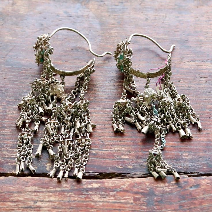 These dangle earrings are antiques that originate from the Qing Dynasty, where a noble woman would have worn an intricate design such as this for a special occasion.Antique stock, made by hand in the late 19th or early 20th century. Length 3 1/2 to 4 1/2 inches. Noble Woman, Articulated Fish, Historical Design, Qing Dynasty, Hand Made Jewelry, Intricate Design, Early 20th Century, Fashion Earrings, Antique Jewelry