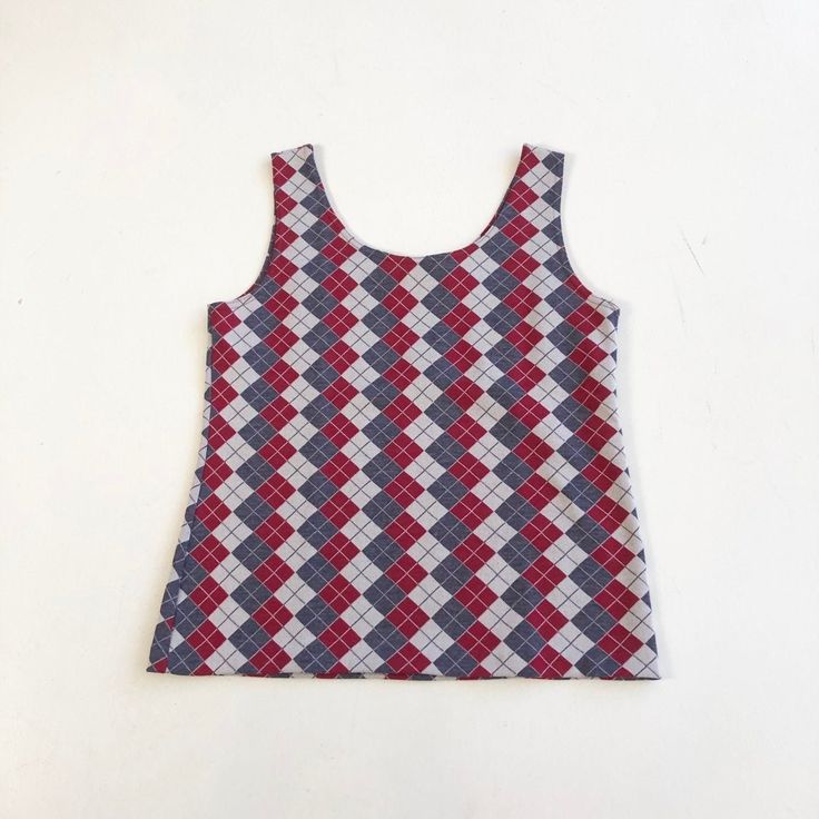 "1970's tank top has an allover red/white/blue argyle design. Label is Montgomery Ward. Condition Excellent. Measurements Bust 39\" Waist 38\" Length 25.5\" Best for a size medium." Vintage Red Sleeveless Top, Downtown Girl Coquette, Kidcore Indie, Big Sweater, Indie Clothes, Feminine Masculine, Big Pants, Young Sheldon, Big Sweaters