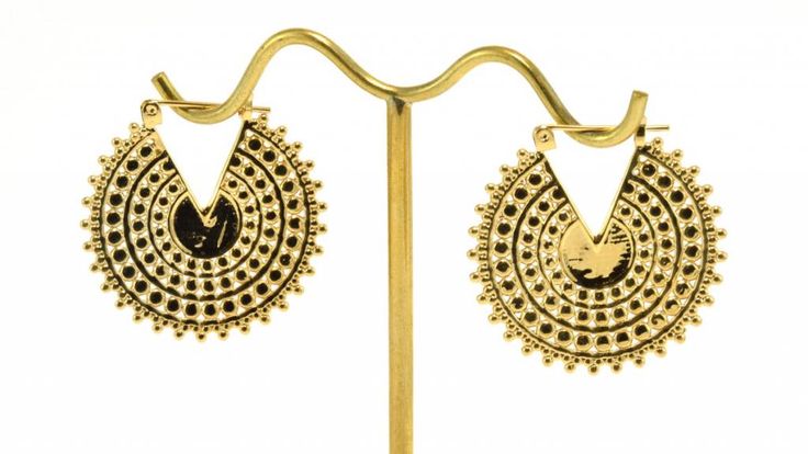 Tawapa's Small Afghan Disc in yellow gold. Luxury Gold Engraved Earrings, Luxury Engraved Gold Earrings, Festival Yellow Gold Brass Jewelry, Festival Yellow Gold Metal Jewelry, Yellow Gold Metal Jewelry For Festivals, Gold Engraved Jewelry For Festival, Bohemian Gold Hallmarked Jewelry, Traditional Gold Jewelry For Festival, Yellow Round Brass Jewelry