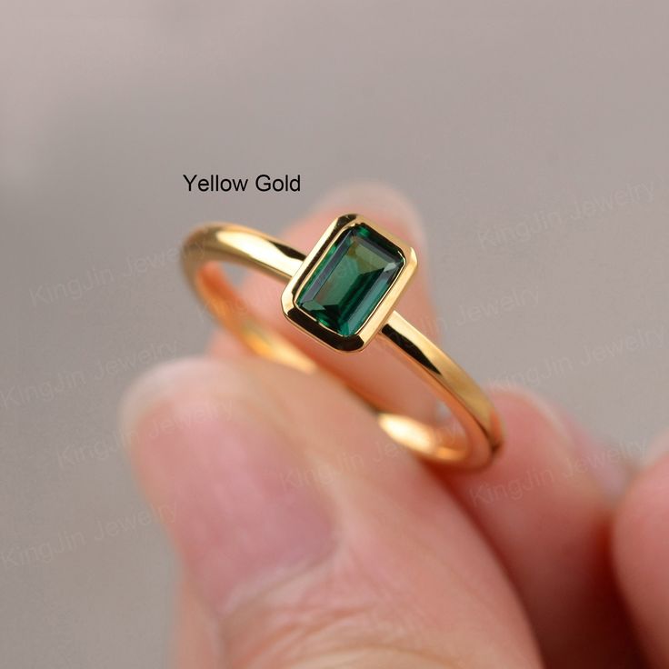 This is a gorgeous handmade creation. Its beauty is its simplicity & Elegance.  The 4*6mm emerald cut lab emerald is crafted in vermeil sterling silver. It is available to customized, if you have any mind, just let me know, we will discuss with it. All item is sent in a beautiful gift box You can realize more lovely stuff clicking the link https://www.etsy.com/shop/knightjewelry?refshopsection_shophome_leftnav Please leave the correct address and you PHONE NUMBER for delivering successfully. Gold Emerald Ring With Radiant Cut, Gold Radiant Cut Emerald Rings, Minimalist Emerald Cut Green Jewelry, Minimalist Emerald Cut Birthstone Ring With Bezel Setting, Stackable Emerald Cut Emerald Ring, Minimalist 14k Gold Emerald-cut Birthstone Ring, Stackable Emerald Cut Emerald Birthstone Ring, Minimalist Gold Emerald Birthstone Ring, Minimalist 14k Gold Emerald Cut Birthstone Ring