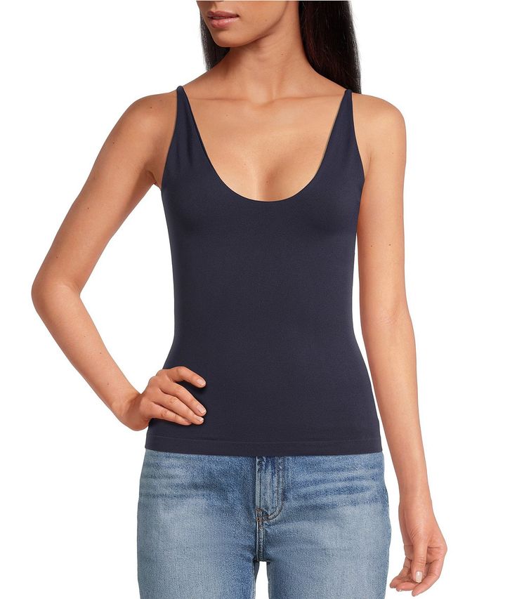 From Free People, this camisole features:scoop necklineSleevelessBuilt-in shelf braEssential basic cami form fittingSeamlessStretch fitFull lengthPullover constructionNylon/elastaneMachine wash/ line dryMade in the USA. Stretch Cami Tank Top With Built-in Bra, Shapewear Tank Top With Built-in Bra And Wide Straps, Second-skin Tank Top With Spaghetti Straps, Smoothing Cami Tank Top, Seamless Second-skin Camisole Tank Top, Stretch Smoothing Camisole With Spaghetti Straps, Scoop Neck Camisole With Built-in Bra, Stretch Camisole With Built-in Bra, Stretch Shapewear Tank Top For Summer