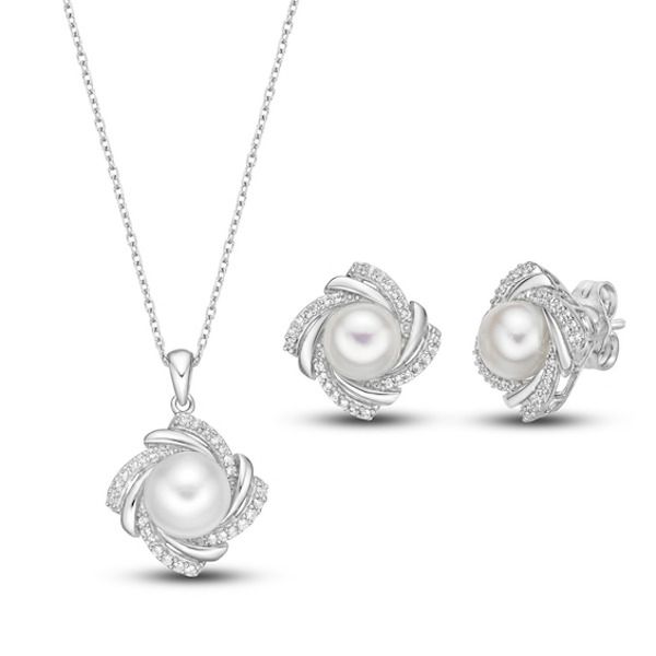 This radiant boxed set features a matching necklace and pair of earrings set in classic sterling silver. Each piece showcases a lustrous freshwater cultured pearl surrounded by a dazzling frame of white lab-created sapphires. The pendant hangs from an 18-inch cable chain and secures with a lobster clasp. Classic White Gold Jewelry Set, Classic White Gold Jewelry Set For Gifts, Classic White Gold Jewelry Sets As Gift, Classic White Gold Jewelry Set Gift, Elegant Jewelry Sets With Matching Earrings For Mother's Day, Elegant Jewelry Sets For Anniversary And Mother's Day, Elegant Formal Jewelry Sets With Pearl Pendant, Elegant Pearl Pendant Jewelry Set For Formal Occasions, Elegant Formal Jewelry Sets For Mother's Day