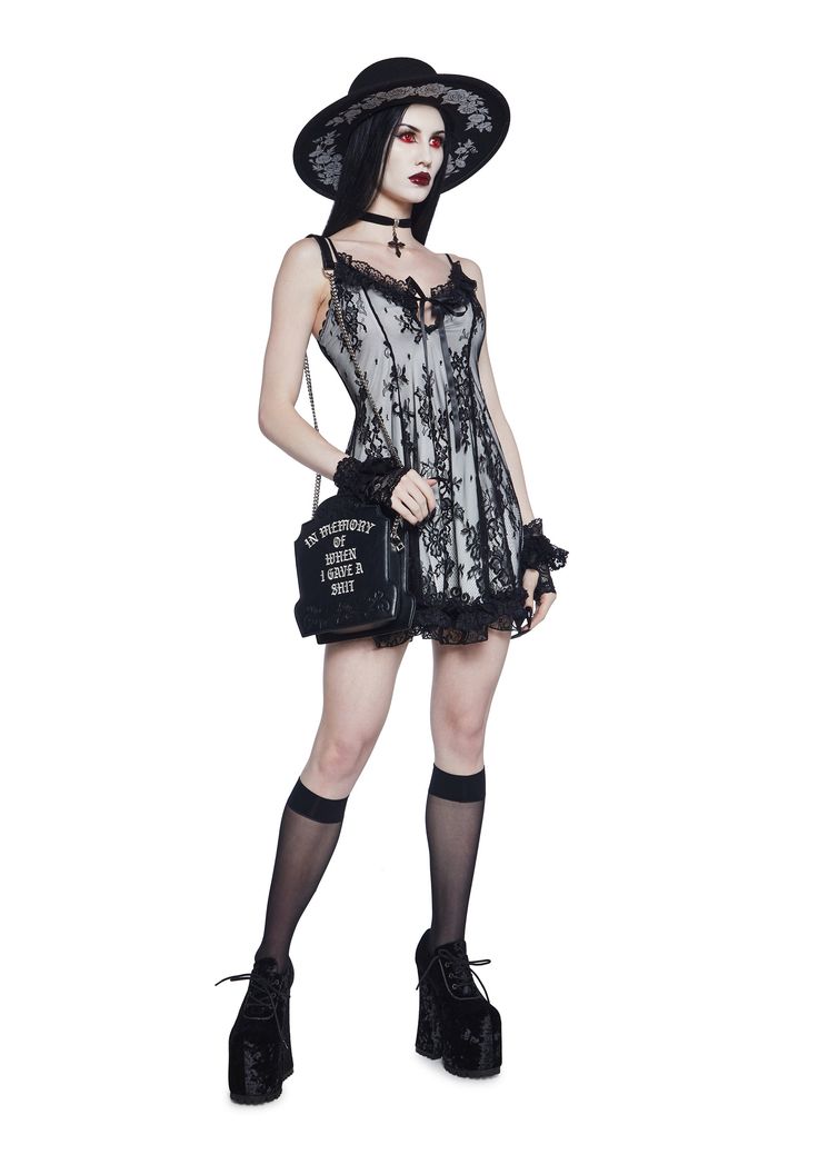 because you're the most bewitching bloom. Take me down in this mini dress with a contrast colored lining, lace upper layer, a swing dress fit and ruffles at the bust and hem. Punk Plaid, Occult Fashion, Victorian Goth, Goth Dress, New Dresses, Lace Dress Black, Plaid Pants, Ivory Lace, Dolls Kill